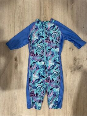 Coolibar toddler girl neck to knee Blue Seashell Print Zip-Front swimwuit